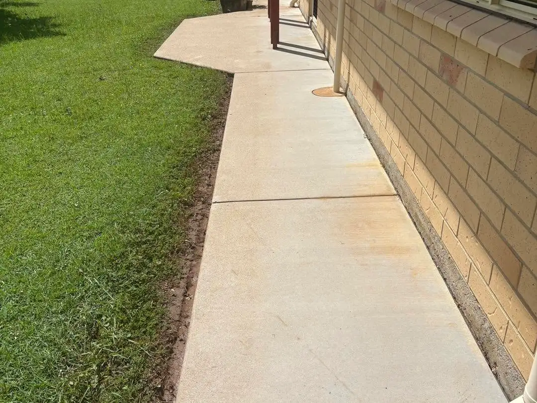 Clean concrete side path after pressure washing